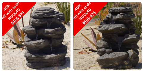A desert rock fountain with a sign saying 40% off sale in Riverside and San Diego.